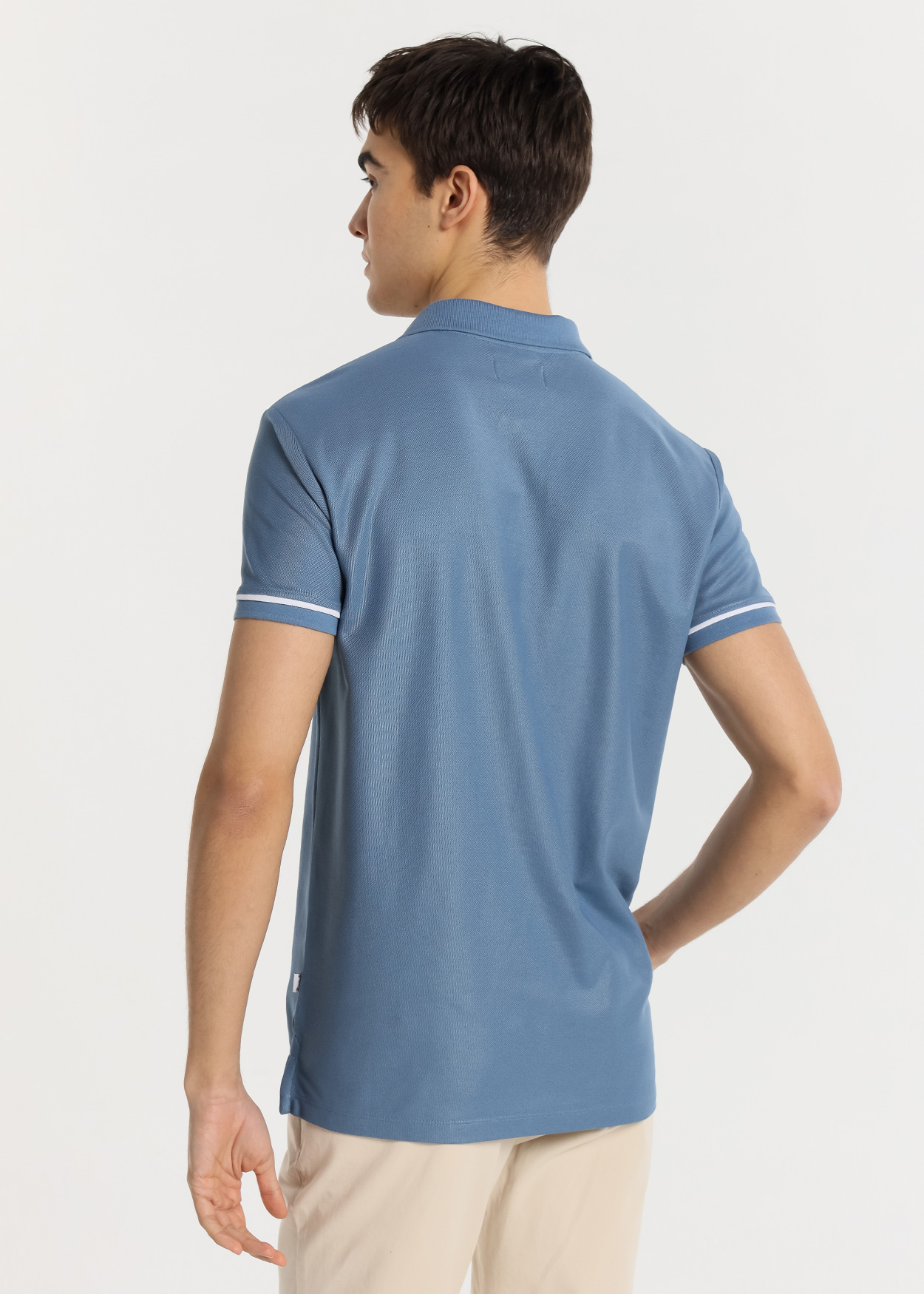 Pólo manga curta com detalhe na manga Azul