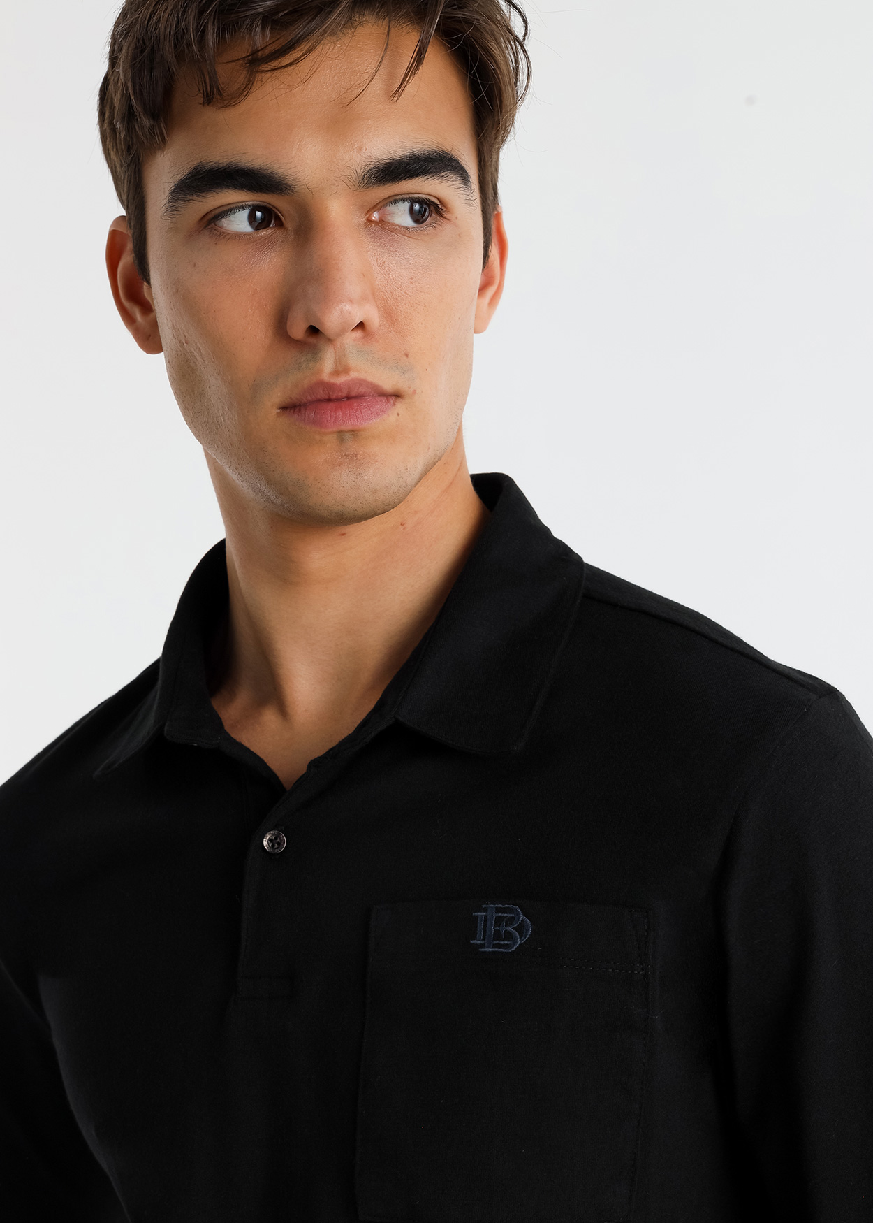 Pólo liso de manga comprida com bolso Preto